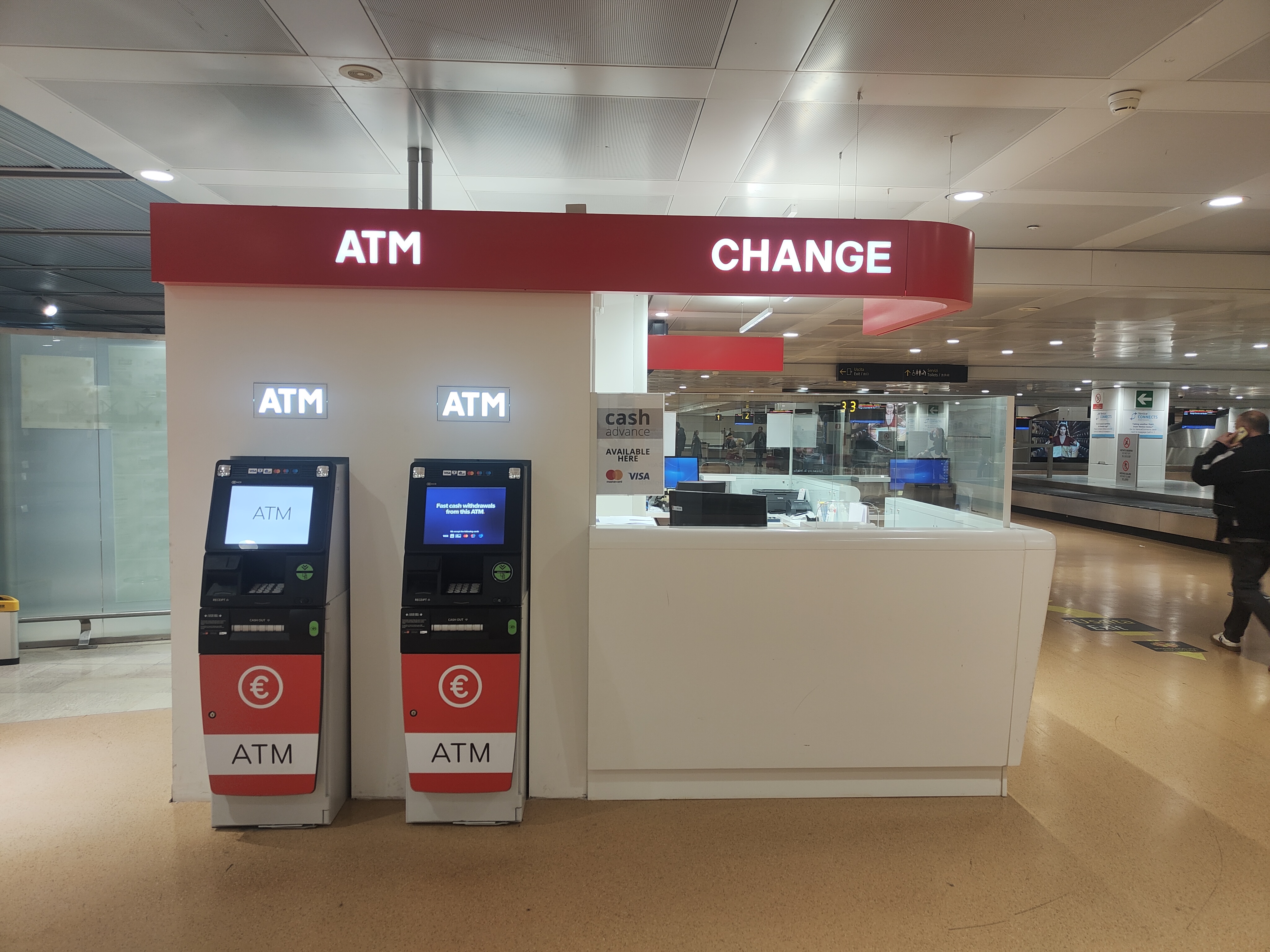 Left view, with ATM's, of the yex Change agency at the airside arrivals area of ​​Venice airport