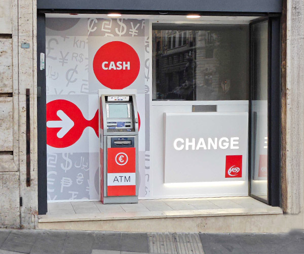 yex Change Agency in Piazza Barberini in Rome, with currency exchange counter and ATM service